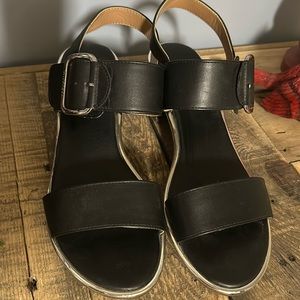 Ladies Tommy Hilfiger black sandals with silver edging. Size 9